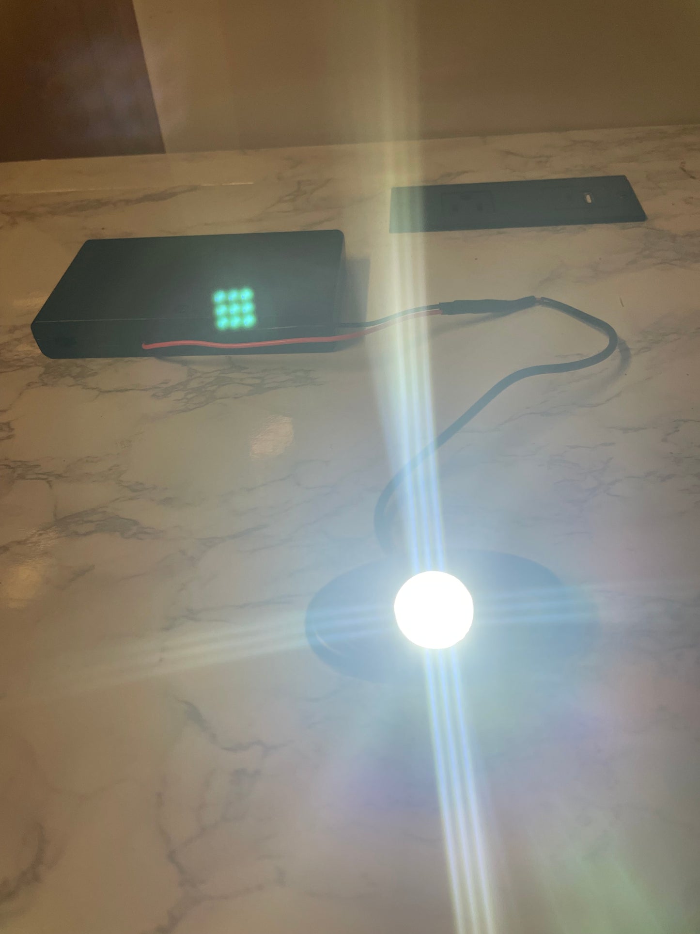 Battery powered rock light with switch