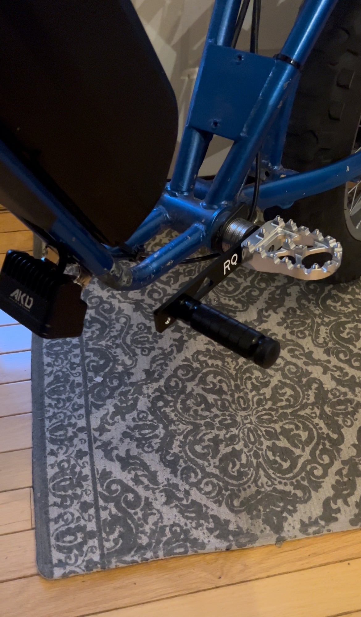 Shiftlock for all peg converted e-bikes